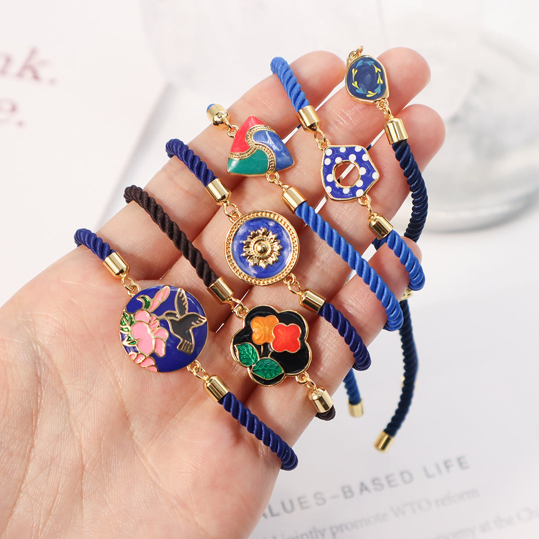 Factory Wholesale Various Women Custom Manufacture Blue Ajustable Rope Gold Plated Flower Bird White Dot Enamel Charm bracelet