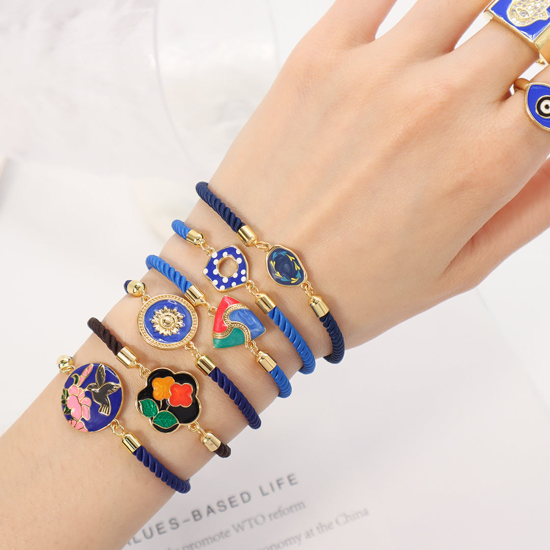 Factory Wholesale Various Women Custom Manufacture Blue Ajustable Rope Gold Plated Flower Bird White Dot Enamel Charm bracelet