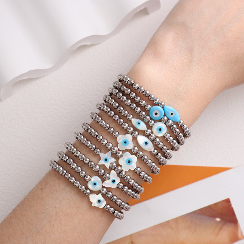 OEM Wholesale Fashion Custom Handmade Flower Butterfly Heart Star Evil Eyes Shell Charm Stainless Steel Beads Bracelet For Women