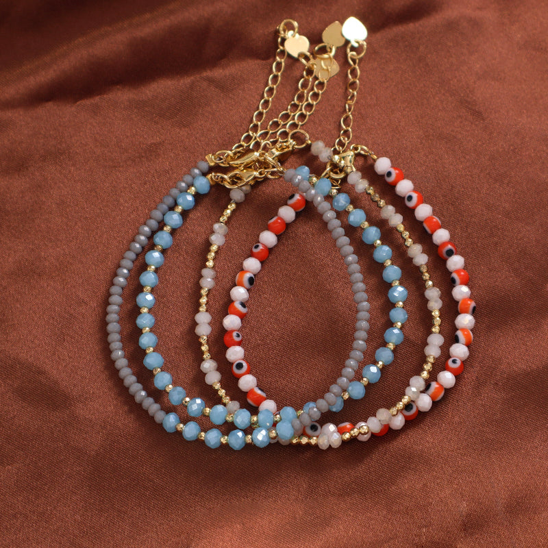Varioius Wholesale OEM Custom Women Jewelry Ajustable Handmade 4mm Glass Crystal Coloured Glaze Evil Eyes Charm Bracelet